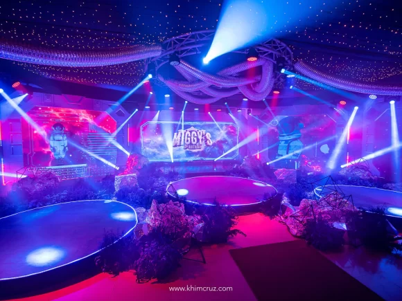 Immersive 180-degree panoramic spacecraft console stage backdrop for a space-themed birthday party