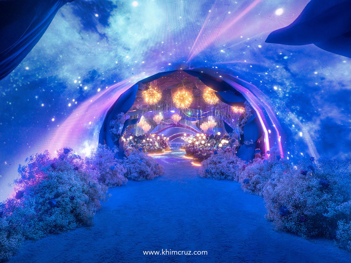 LED wall tunnel with shifting celestial images leads to a stunning floral landscape at this celestial-themed Salangguni