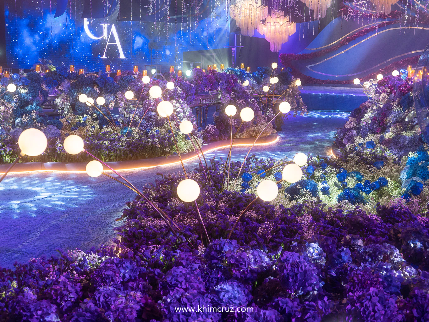 floral landscape pathway of a celestial themed Salangguni ballroom reception