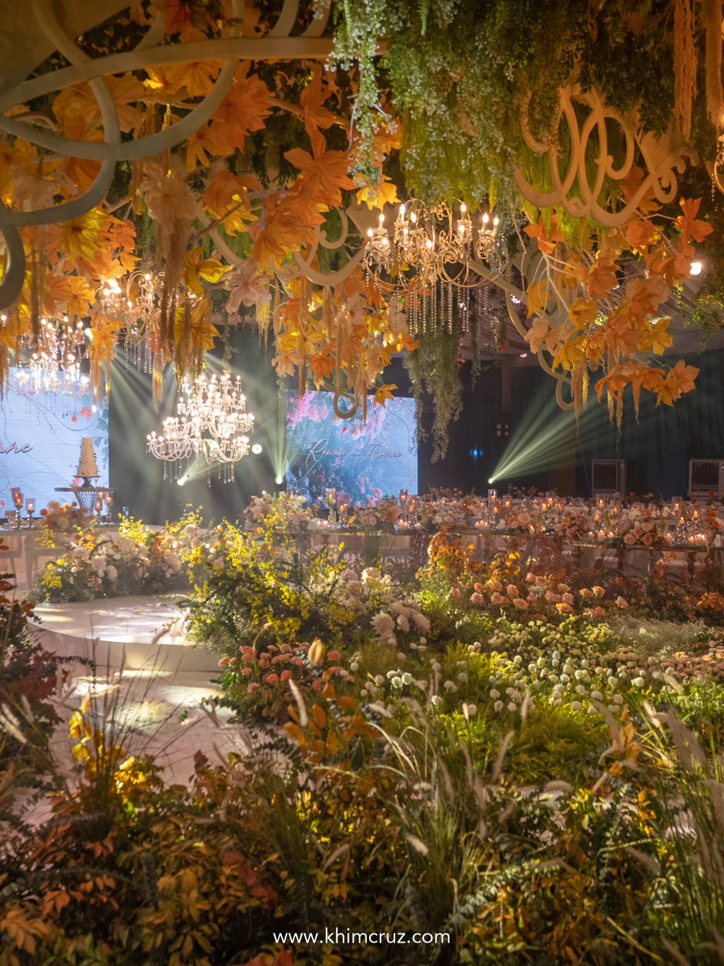 ballroom adorned with blend of spring and autumn hues showcasing a vibrant landscape of blooming flowers